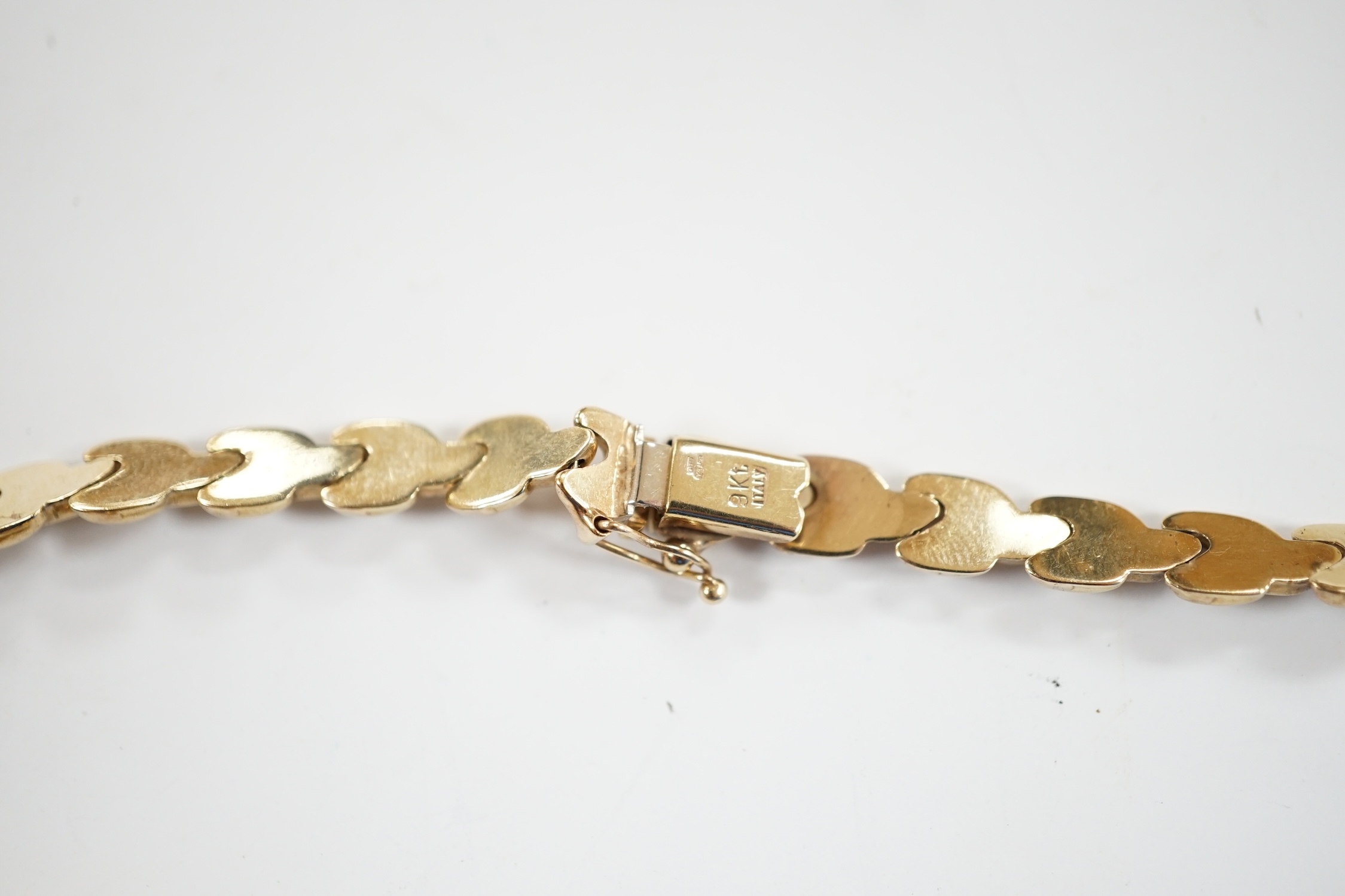 A modern 9ct gold flat link necklace, 34cm, 11.5 grams.